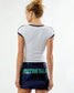 Model wearing a white fitted tee with a navy blue Notre Dame sequin mini skirt on a white background