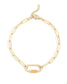 Gold paperclip charm bracelet with front charm holder clasp on a white background