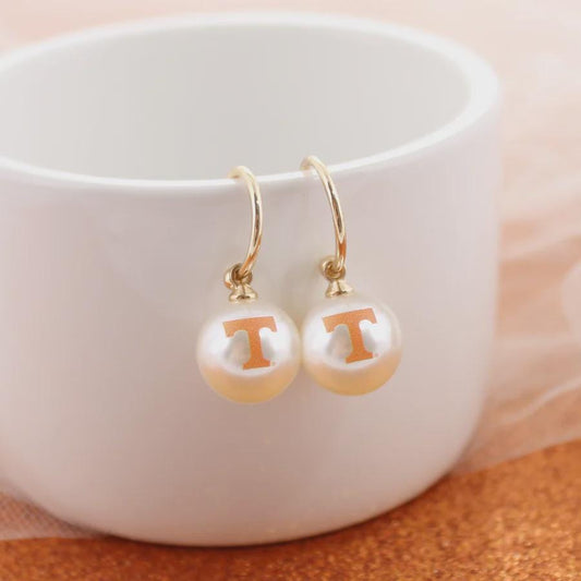 University of Tennessee pearl huggie hoop earrings with orange Power T logo on gold hoops