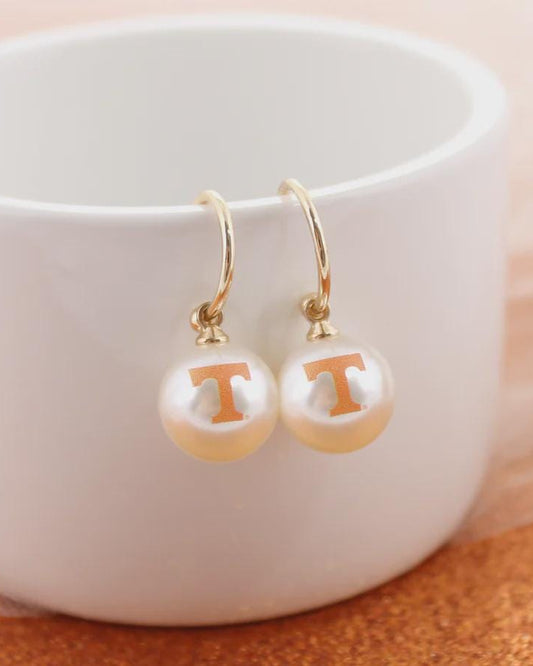 University of Tennessee pearl huggie hoop earrings with orange Power T logo on gold hoops