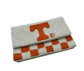 Side angle of handmade beaded Tennessee Volunteers crossbody clutch showing beaded texture and fold-over design