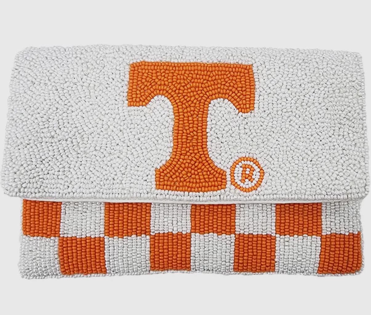 Beaded Tennessee Volunteers crossbody clutch purse with orange "T" logo and orange checkered pattern on white background